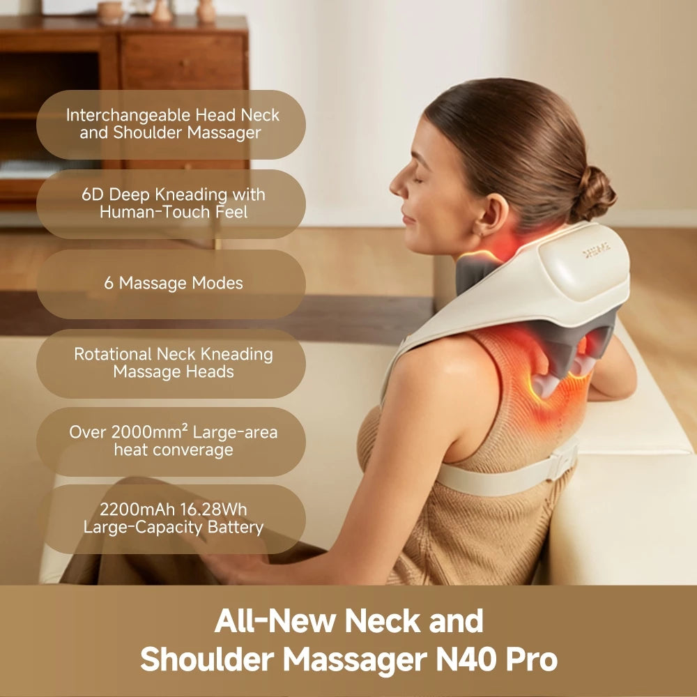 Neck and shoulder massager on shoulders with cream shell and rotating neck heads