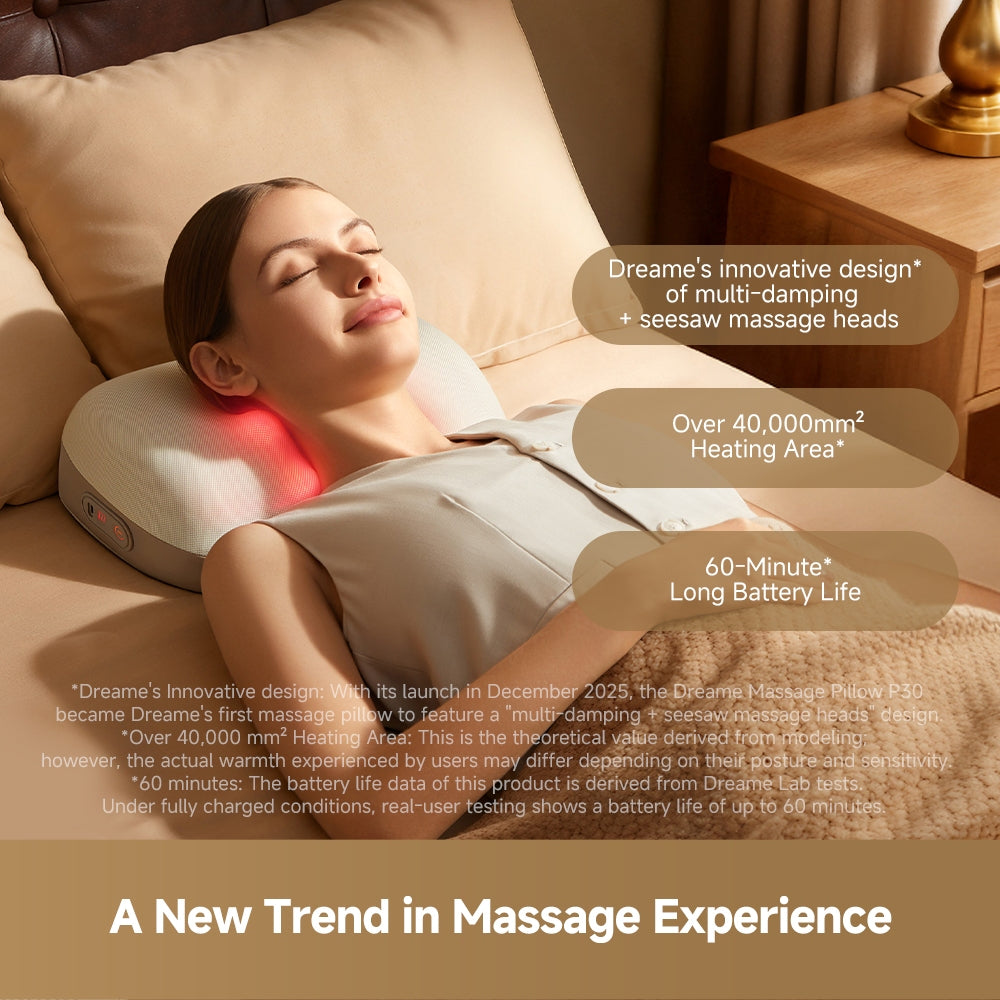 Pillow massager with warming glow, used while lying on a bed