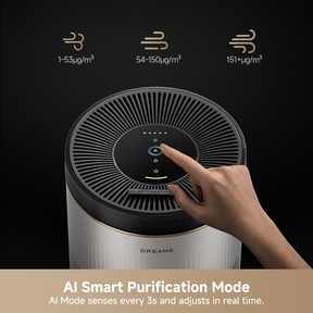 Dreame air purifier top control dial with indicator lights and a hand adjusting settings.
