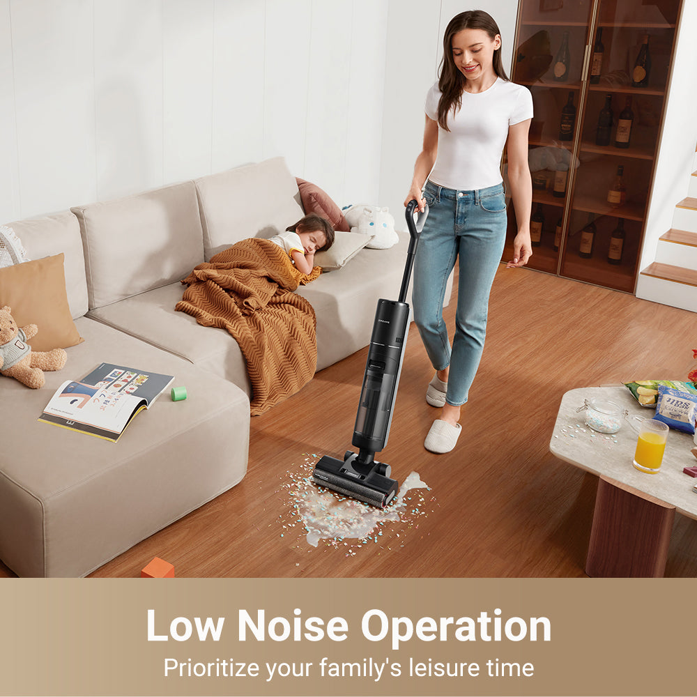 Cordless vacuum with mop roller head in use on hard floor