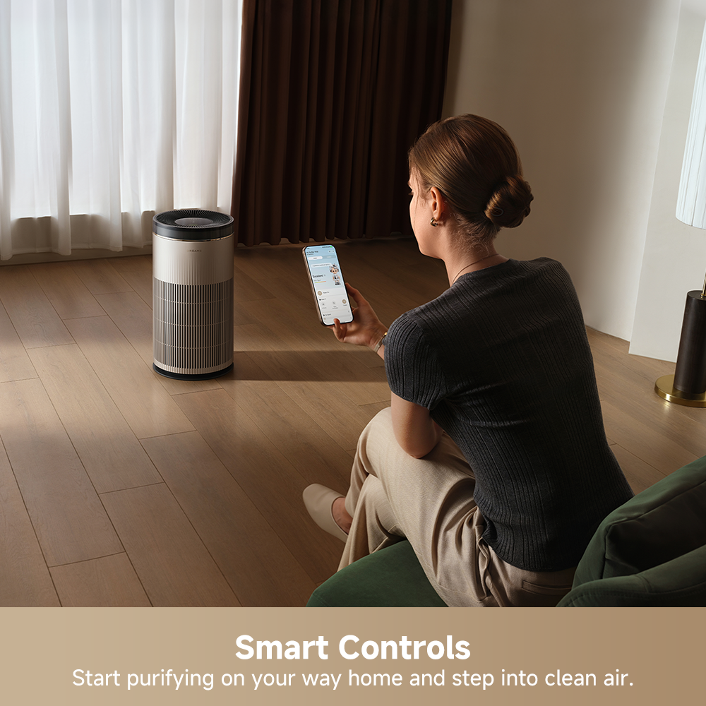 Dreame air purifier used with a smartphone for smart controls while running.