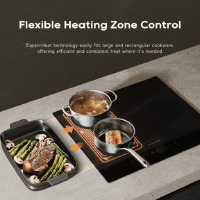 Black induction cooktop with two pans and flexible heating zone orange heat lines