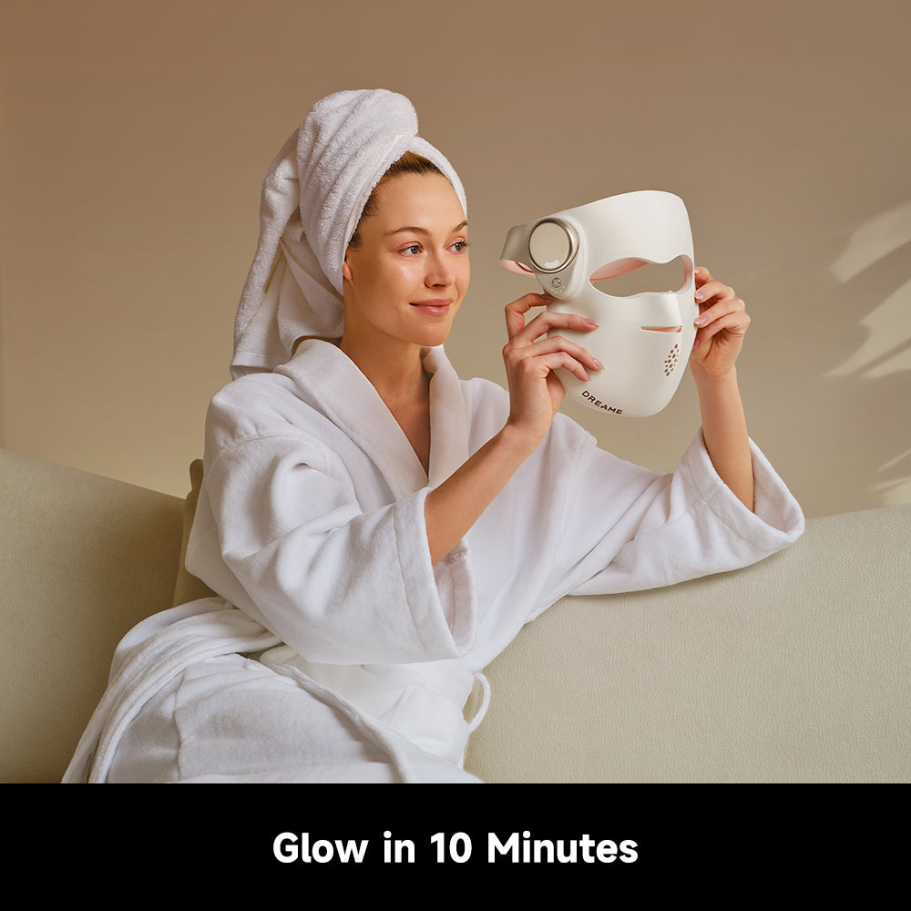 LED anti-aging face mask worn with soft strap and round control dial
