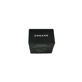 Universal travel adapter plug box with DREAME logo and US/JP/TW conversion graphic