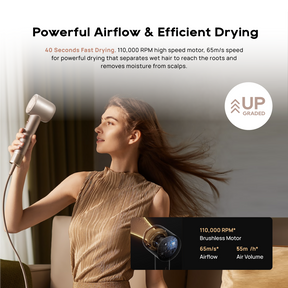 Gold hairdryer in use, held near hair with airflow from the nozzle