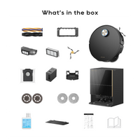 Robot vacuum and mop accessory set laid out, including dock parts and filters