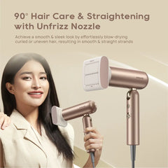 Rose gold hair dryer with unfrizz nozzle attachment for smooth, straight strands