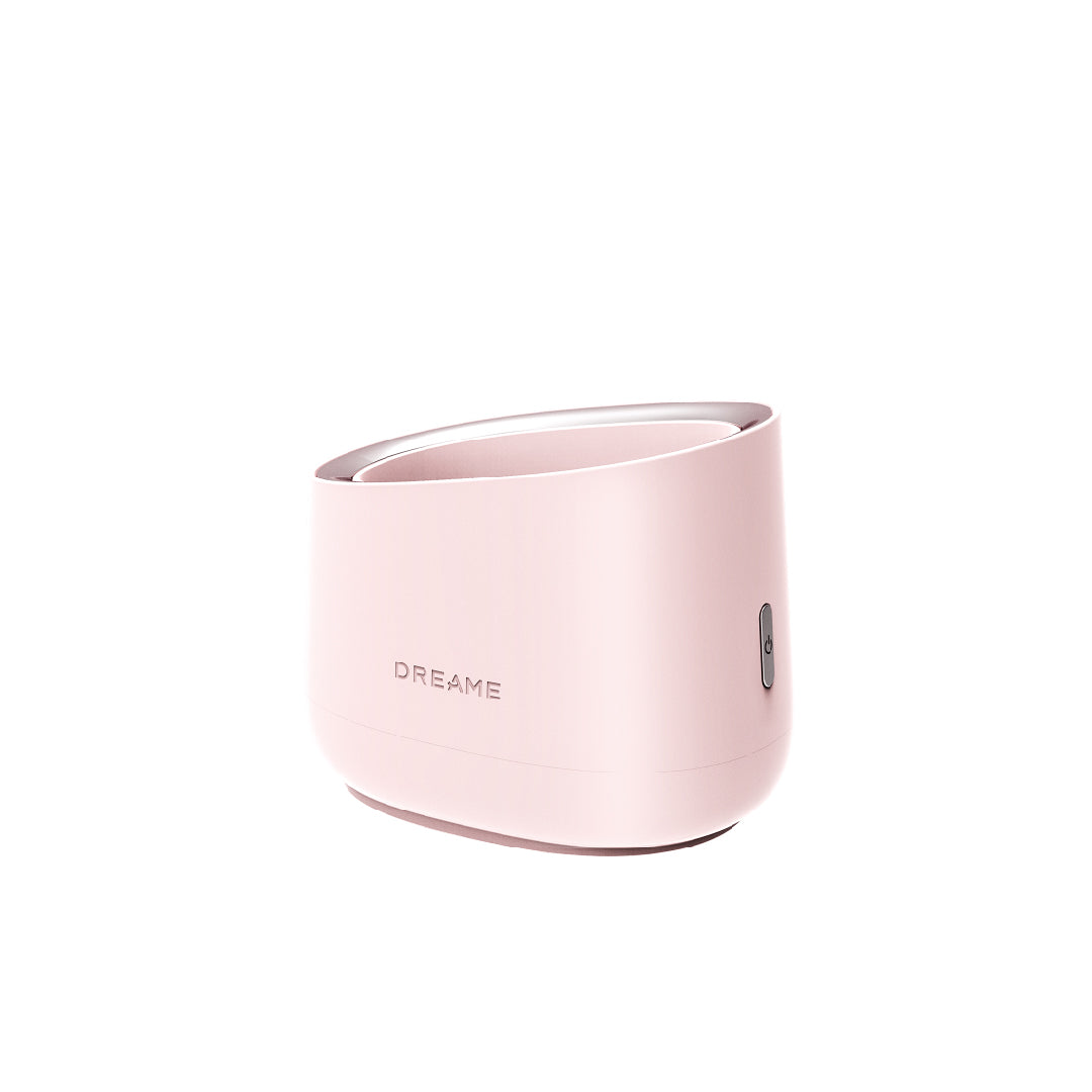 Pink Dreame IPL sterilization base with side control panel and lid