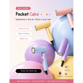 Handheld hair dryer in pink and yellow with purple unit shown on a display
