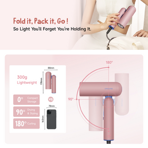 Pink compact handheld hair dryer with foldable design and narrow nozzle